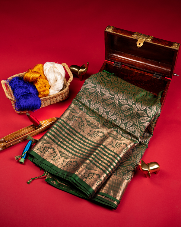 Yellow pattu saree with green