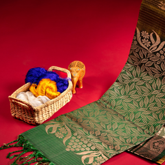 Yellow pattu saree with green