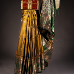 Yellow pattu saree with green