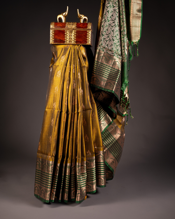 Yellow pattu saree with green